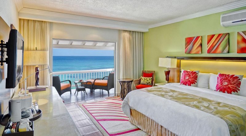 Ocean Front Room With Sleeper Chair Tamarind by Elegant Hotels