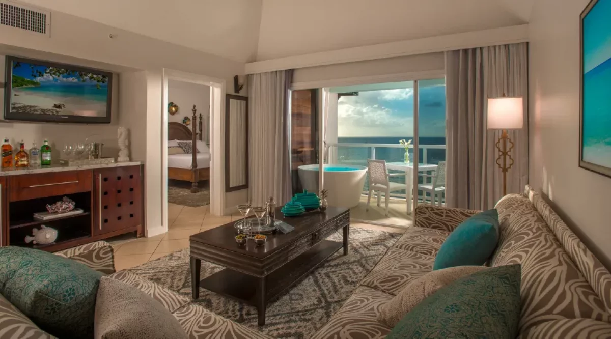 Sunset Bluff Oceanview One Bedroom Butler Suite with Balcony Tranquility Soaking Tub Sandals Regency La Toc